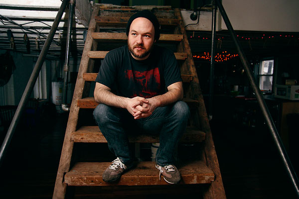 [A photo of me sitting on stairs]